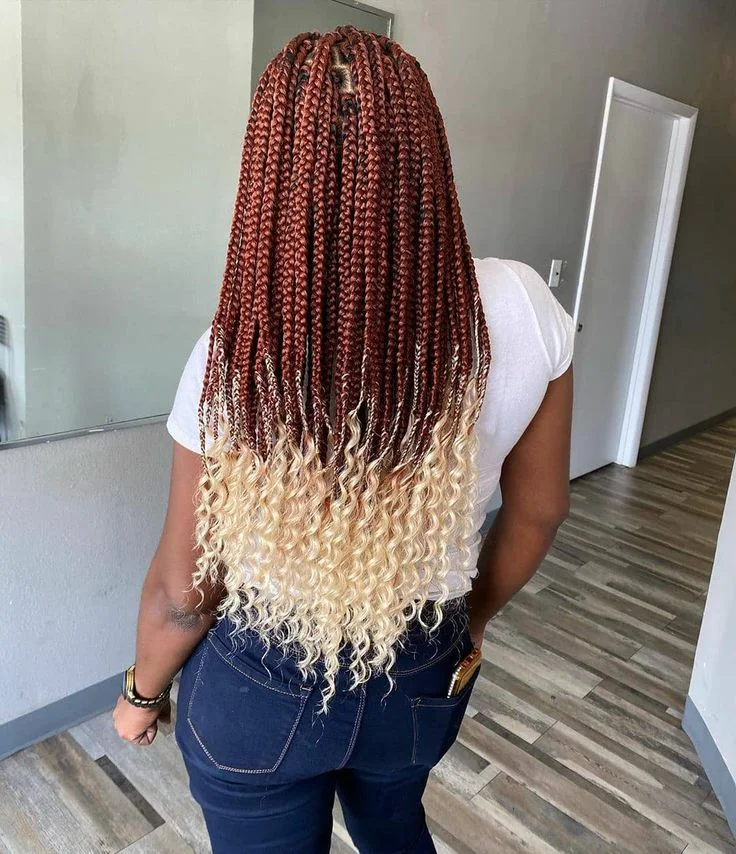woman on box braids with deep wave ends in the UK